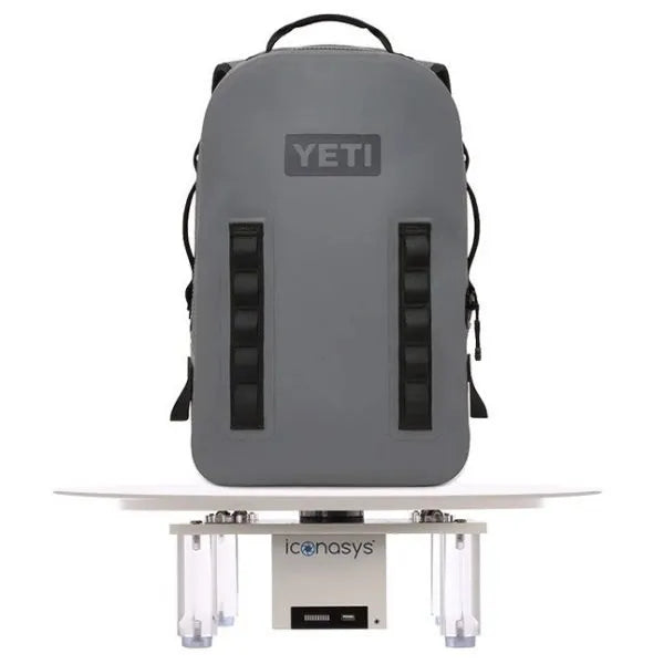 Large photography turntable with a YETI backpack showcased for product photography.