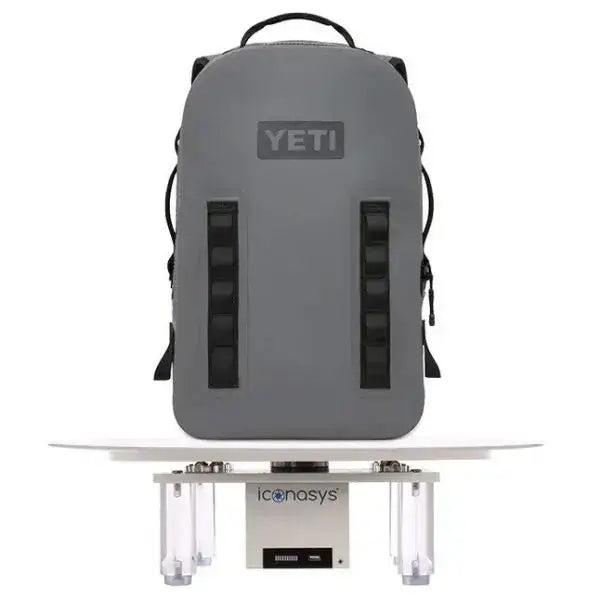 Large photography turntable with a YETI backpack showcased for product photography.