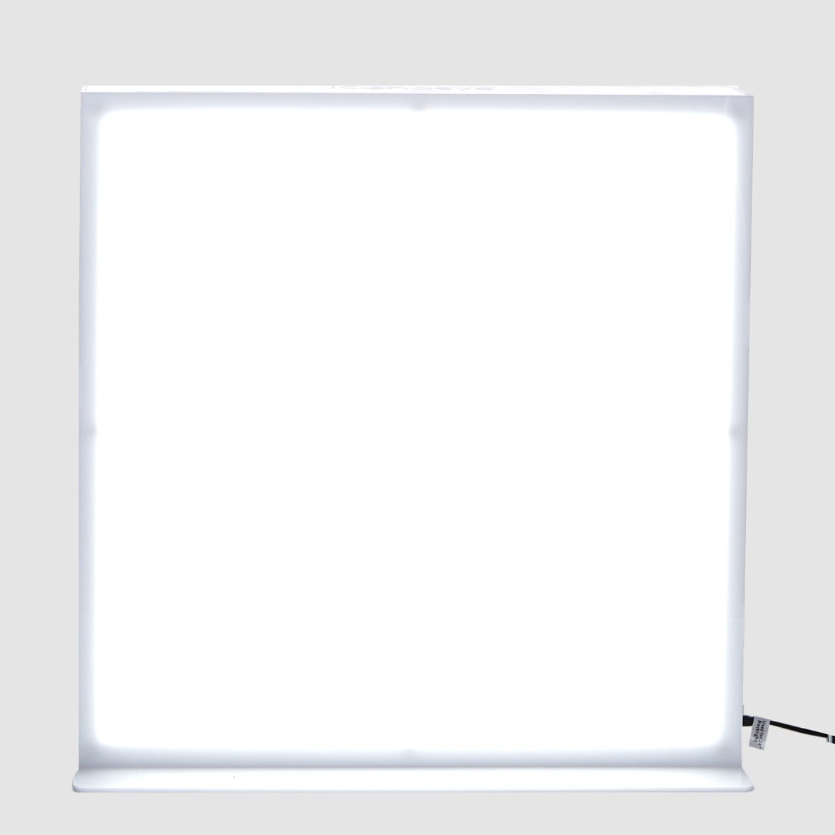 LumiPad LED photography panel glowing with bright light, ideal for professional photography studios.