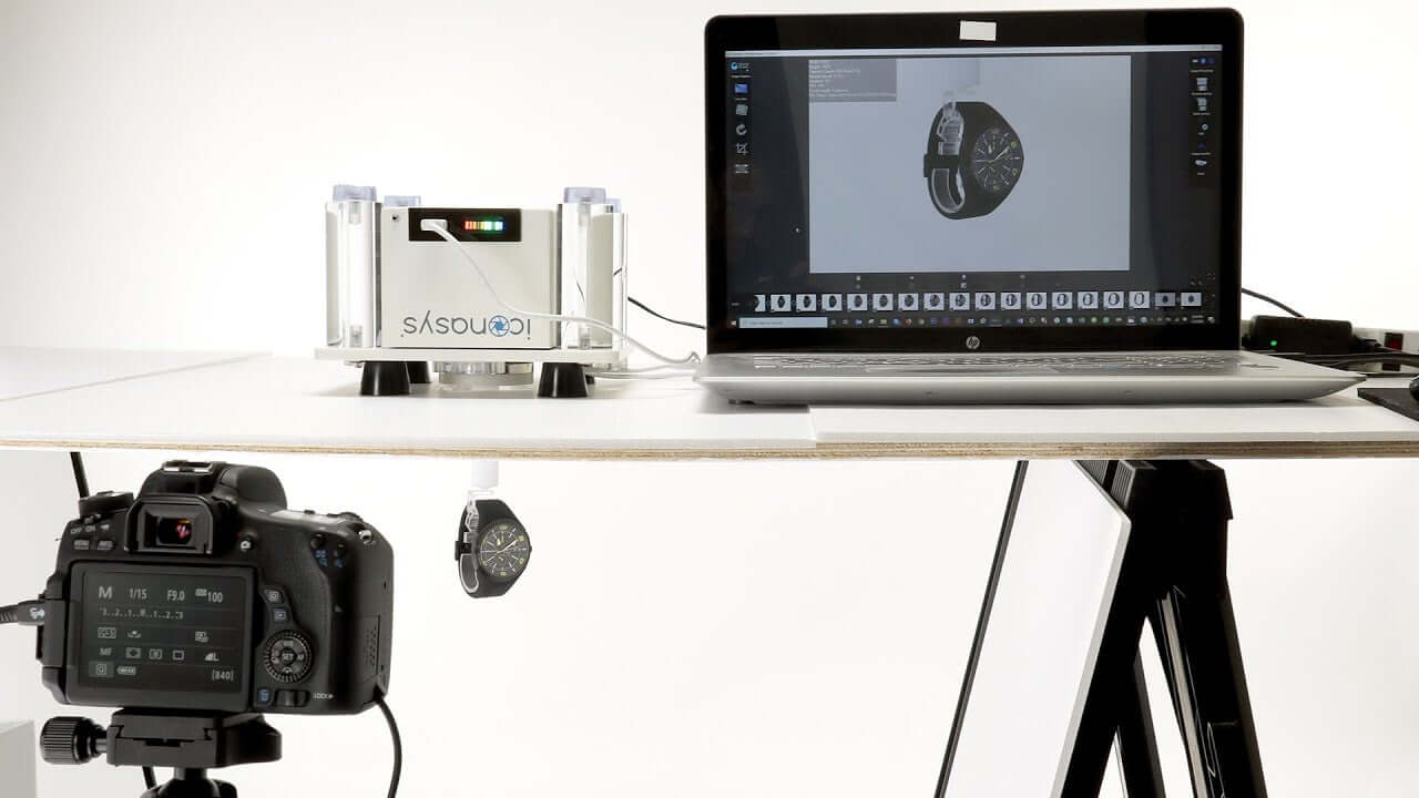 360 product photography turntable setup with camera and laptop for seamless product image capture.